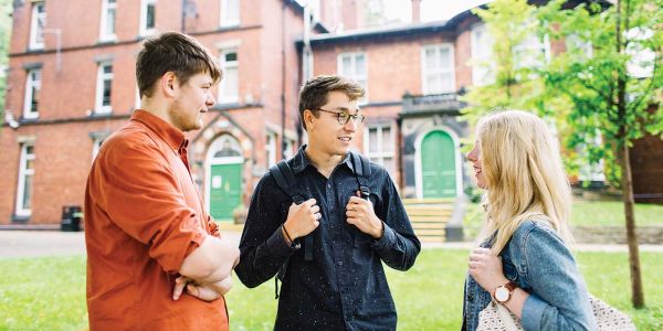 Students talking outside of Lyddon Hall