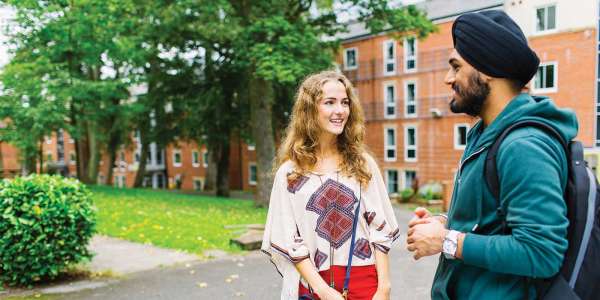 Students talking outside James Baillie